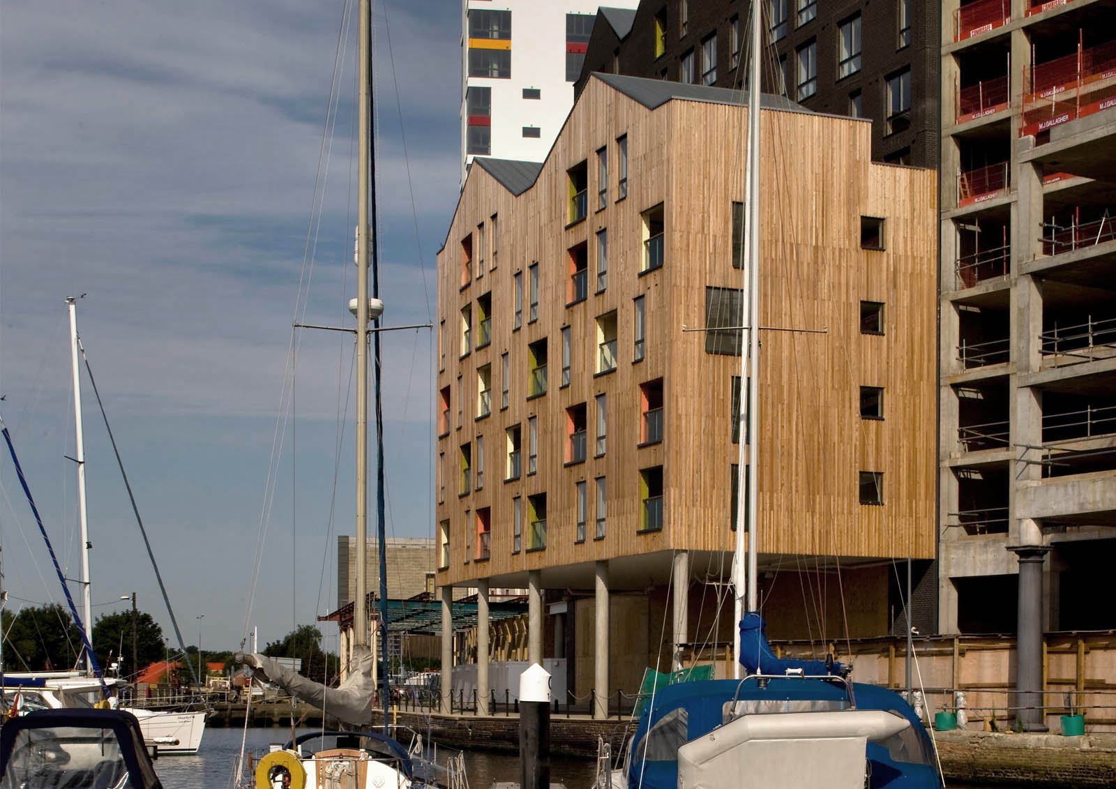 Mixed-use waterfront development, timber clad housing